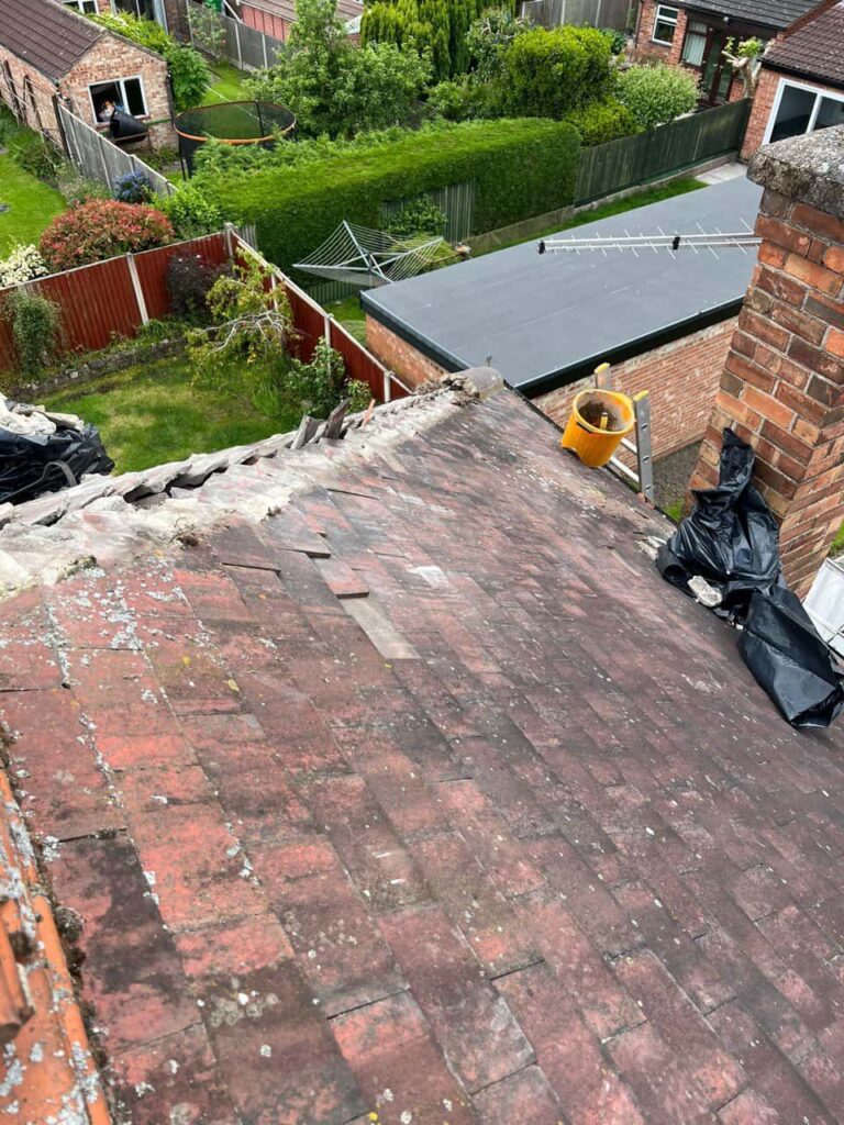 This is a photo of a roof where the hip tiles have been removed, and are just about to be replaced. Works carried out by TRP Roofing Hessle