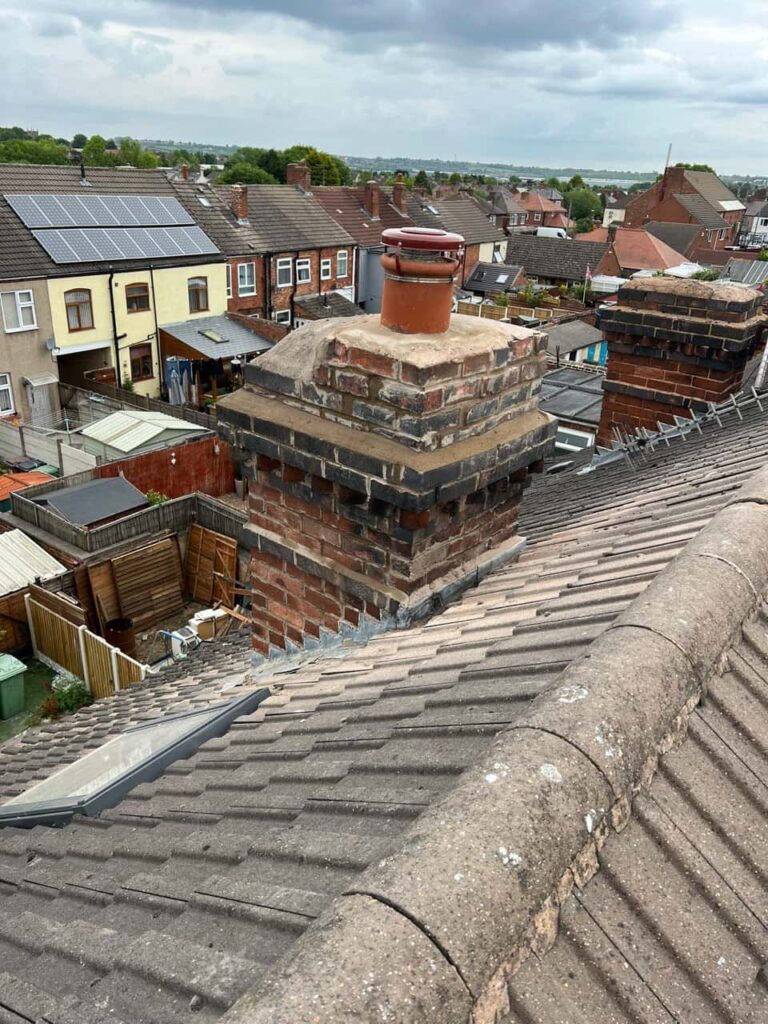 This is a photo taken from a roof which is being repaired by TRP Roofing Hessle it shows a street of houses, and their roofs